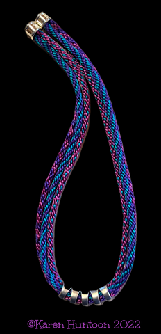 "8-strand Kongoh Gumi Three Braid Necklace with Curved Focal" - Fuchsia, Caribbean Blue & Purple
