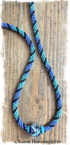"******8-strand Beaded Color Block Swirl Necklace with Boro Glass Focal" - Orion