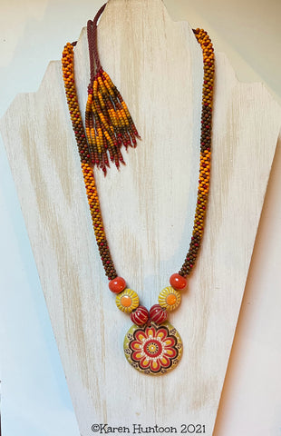 "**8/0 Beaded Colorblock Kumihimo Necklace - Golem Snowflake Pendant & Accent Beads"- Mustard.